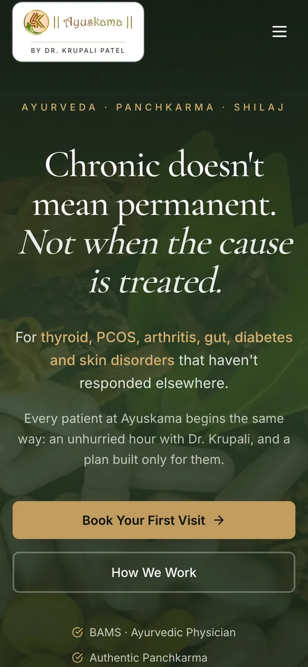 Ayuskama Ayurveda website on a phone